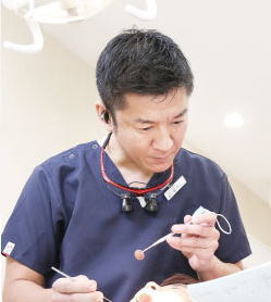 歯科医師：田中 一郎